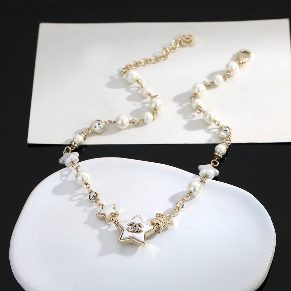 CHANEL Gold and White Star Necklace